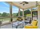 Relaxing screened-in porch with comfortable seating and a view of the outdoors at 3920 Ineal Dr, Cumming, GA 30028