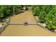 Aerial view of a gazebo on a dock on the lake at 4810 Duncans Lake Dr, Buford, GA 30519