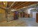 Spacious unfinished basement with visible ductwork, wooden frame walls, and concrete floor at 4810 Duncans Lake Dr, Buford, GA 30519