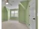 Bright green bedroom with natural light from window at 4810 Duncans Lake Dr, Buford, GA 30519