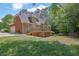 Back exterior showcasing a large deck and a well-maintained backyard at 4810 Duncans Lake Dr, Buford, GA 30519