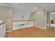 Upstairs hallway with hardwood floors and view of the lower level at 4810 Duncans Lake Dr, Buford, GA 30519
