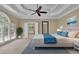 Tranquil main bedroom with tray ceilings, lots of natural light, and a relaxing atmosphere at 4810 Duncans Lake Dr, Buford, GA 30519
