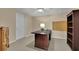 Office room features an antique desk with wooden shelves at 4810 Duncans Lake Dr, Buford, GA 30519