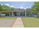 Open-air pavilion with picnic tables, set against a green lawn at 4810 Duncans Lake Dr, Buford, GA 30519