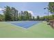 Community has two tennis courts with night lighting and shaded benches for spectators at 4810 Duncans Lake Dr, Buford, GA 30519