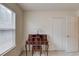 Office space featuring traditional wooden desk with drawers and natural light from windows at 512 Antler Ln, Suwanee, GA 30024