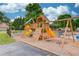 Community playground with slides, swings, and climbing features for enjoyment at 512 Antler Ln, Suwanee, GA 30024