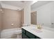 Bathroom featuring a vanity, shower with tile surround, and updated fixtures at 5244 Carrington Park Dr, Powder Springs, GA 30127