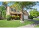 Charming home with blue shutters, brick accents, and a well-maintained front lawn at 5244 Carrington Park Dr, Powder Springs, GA 30127