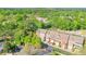 A scenic aerial view of the townhome community surrounded by lush trees and greenery at 12084 Cotton Aly, Alpharetta, GA 30009