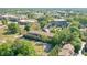 Expansive aerial view showcasing the community, surrounded by lush greenery and city views at 12084 Cotton Aly, Alpharetta, GA 30009