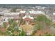 Expansive aerial view showcasing the community's layout, including green spaces and architectural details at 12084 Cotton Aly, Alpharetta, GA 30009