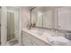 Bright bathroom with sleek vanity and a shower/tub combo, perfect for relaxation and functionality at 12084 Cotton Aly, Alpharetta, GA 30009