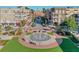 Charming town center featuring a fountain, seating areas, and storefronts, creating a vibrant community hub at 12084 Cotton Aly, Alpharetta, GA 30009
