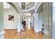 Welcoming foyer with hardwood floors, staircase, and arched doorways at 1897 8Th St, Atlanta, GA 30341