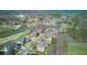 A high-angle shot shows a community near a beautiful lake and golf course at 198 Grandmar Chase, Canton, GA 30115