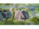 An aerial view of a charming house with a well-maintained yard and deck in a desirable neighborhood at 198 Grandmar Chase, Canton, GA 30115