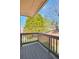 Balcony showcasing wooden railing overlooking yard at 198 Grandmar Chase, Canton, GA 30115