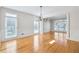 Bright dining room with hardwood floors, elegant chandelier and large windows at 198 Grandmar Chase, Canton, GA 30115