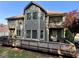 Back of house with large deck and a walk-out basement at 198 Grandmar Chase, Canton, GA 30115