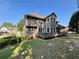 Back of two-story home with large deck and lawn at 198 Grandmar Chase, Canton, GA 30115