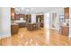 Spacious kitchen with wooden cabinets, central island, and hardwood floors at 198 Grandmar Chase, Canton, GA 30115