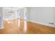 Living room with hardwood floors, decorative columns and white molding at 198 Grandmar Chase, Canton, GA 30115