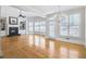 Large living room boasts fireplace, built-ins, and hardwood floors at 198 Grandmar Chase, Canton, GA 30115