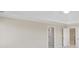 Bright room featuring neutral walls, white trim, with doors to other rooms at 198 Grandmar Chase, Canton, GA 30115