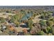 Picturesque aerial view of a lush green park, complete with a serene lake surrounded by colorful trees at 273 12Th Ne St # 421, Atlanta, GA 30309