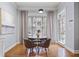 Charming dining area features hardwood floors and plenty of natural light at 273 12Th Ne St # 421, Atlanta, GA 30309