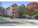 An exterior shot of the red brick apartment complex from street level at 273 12Th Ne St # 421, Atlanta, GA 30309