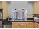 Modern kitchen with stainless steel sink and appliances and granite countertops at 273 12Th Ne St # 421, Atlanta, GA 30309