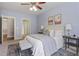Light-filled primary bedroom featuring neutral décor and hardwood flooring at 273 12Th Ne St # 421, Atlanta, GA 30309