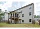 Exterior shot of a home's backyard and deck at 2927 Dolostone Way, Dacula, GA 30019