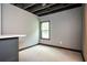 Basement featuring a modern bar area and a window for natural light at 2927 Dolostone Way, Dacula, GA 30019