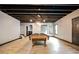 A finished basement with an exposed ceiling, featuring a classic pool table at 2927 Dolostone Way, Dacula, GA 30019