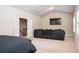 Multi-purpose bonus room featuring comfortable lounge furniture and tv at 2927 Dolostone Way, Dacula, GA 30019