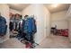 Spacious walk-in closet offering ample storage with shelving and hanging space for clothing and shoes at 2927 Dolostone Way, Dacula, GA 30019