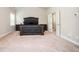 Bright main bedroom featuring a large window, neutral walls, and a sophisticated dark wood bedroom set at 2927 Dolostone Way, Dacula, GA 30019