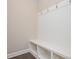 Functional mud room featuring built-in storage and hooks for organization at 2927 Dolostone Way, Dacula, GA 30019