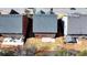 Aerial view of backyards showing patios of three houses at 4892 Kentwood Dr, Marietta, GA 30068
