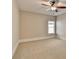 Bedroom featuring neutral walls, plush carpet, natural light, and a contemporary ceiling fan at 4892 Kentwood Dr, Marietta, GA 30068