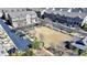 Aerial view of community park with parking in front of townhomes at 4892 Kentwood Dr, Marietta, GA 30068