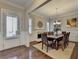 Elegant dining room with hardwood floors, fireplace, and wainscoting at 4892 Kentwood Dr, Marietta, GA 30068