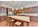 Bright kitchen with island, pendant lighting, and stainless steel appliances at 4892 Kentwood Dr, Marietta, GA 30068