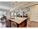 Kitchen with a large island, granite countertops and open floor plan at 4892 Kentwood Dr, Marietta, GA 30068