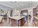Gourmet kitchen with stainless appliances, granite countertops, hardwood floors and a large island at 4892 Kentwood Dr, Marietta, GA 30068