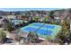 Overhead view of community tennis courts with neighborhood homes at 4892 Kentwood Dr, Marietta, GA 30068